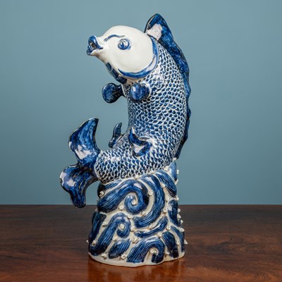 Lot 497 - A Chinese porcelain fish figure