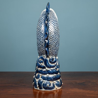Lot 497 - A Chinese porcelain fish figure
