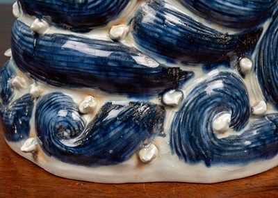 Lot 497 - A Chinese porcelain fish figure