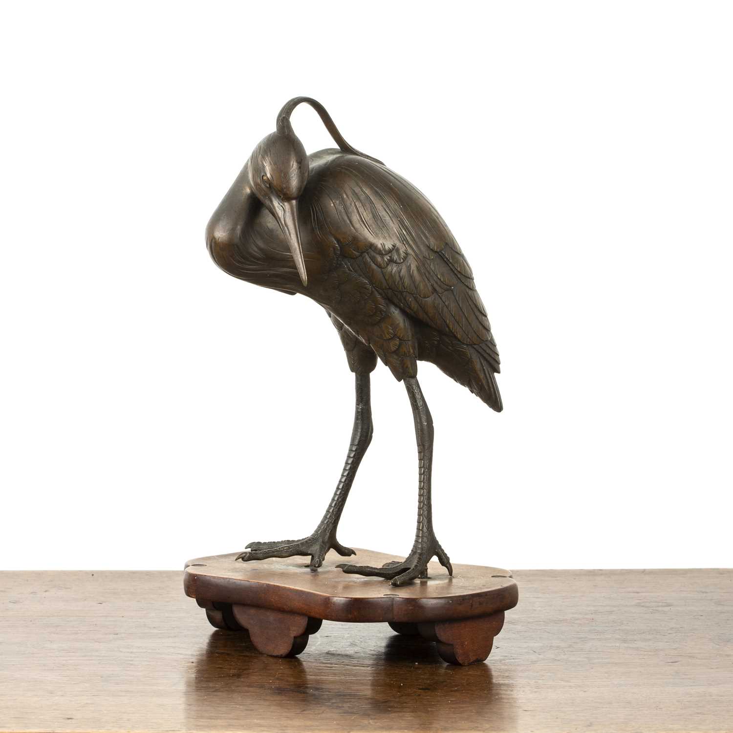 Lot 600 - Bronze okimono of a standing heron Japanese,...