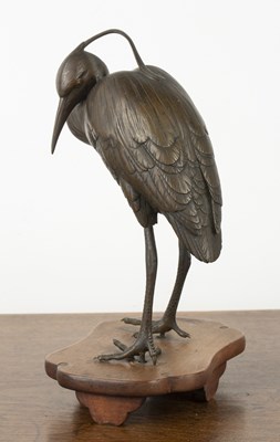 Lot 600 - Bronze okimono of a standing heron Japanese,...
