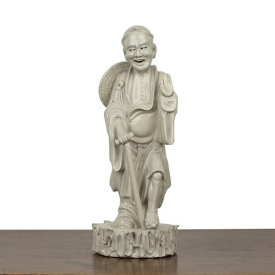 Lot 279 - Dehua blanc de chine standing figure Chinese,...