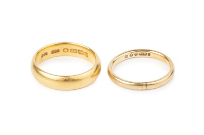 Lot 42 - A 22ct gold wedding band, and a 9ct gold...