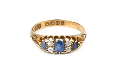 Lot 65 - A sapphire and diamond half hoop ring, the...