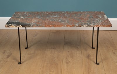 Lot 244 - A red marble-topped low coffee table