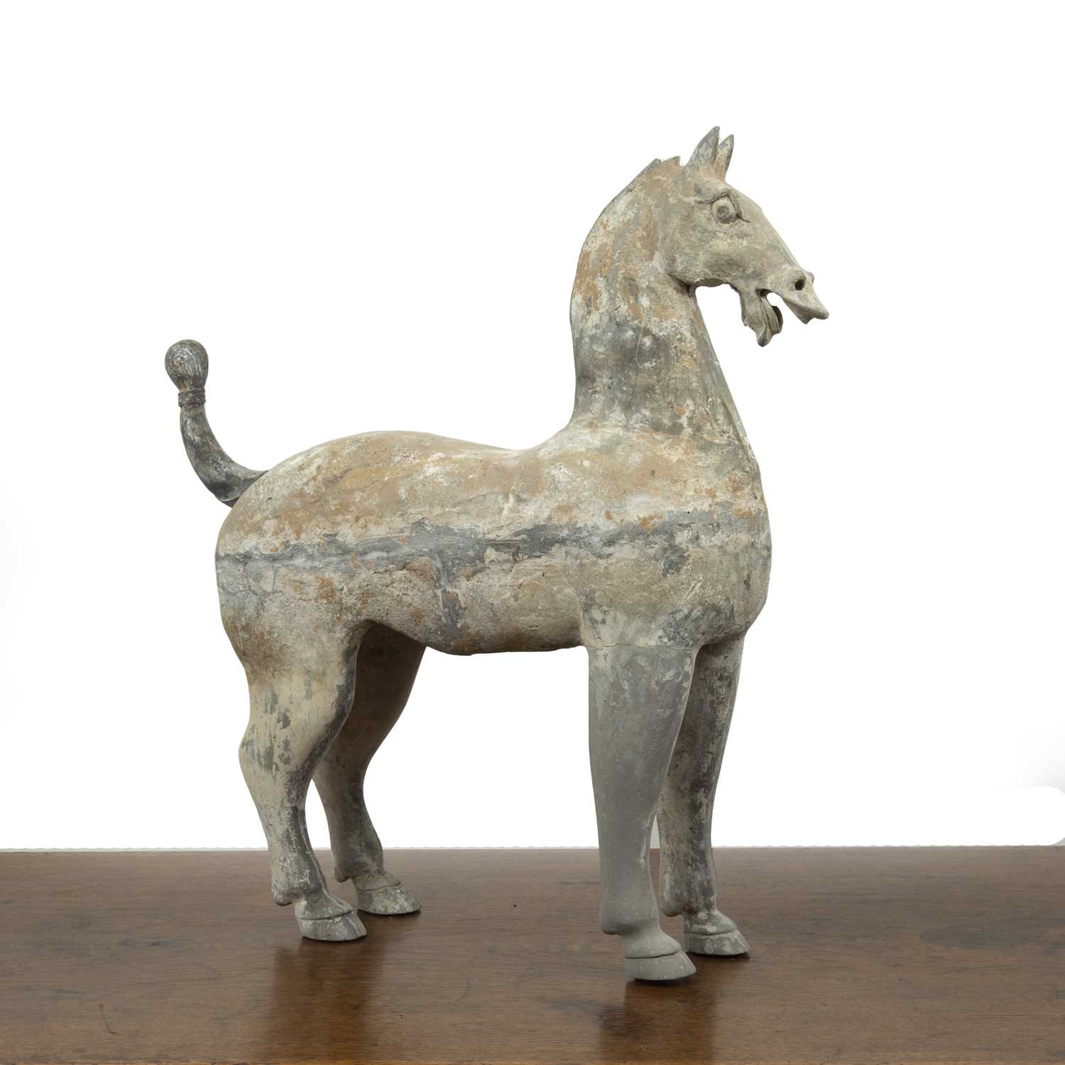 Lot 439 - Painted pottery model of a horse Chinese, Han...