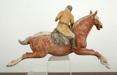 Lot 441 - Painted pottery polo player Chinese, Tang...