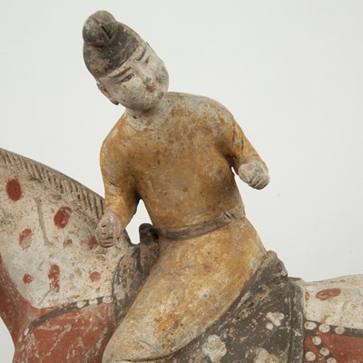 Lot 441 - Painted pottery polo player Chinese, Tang...