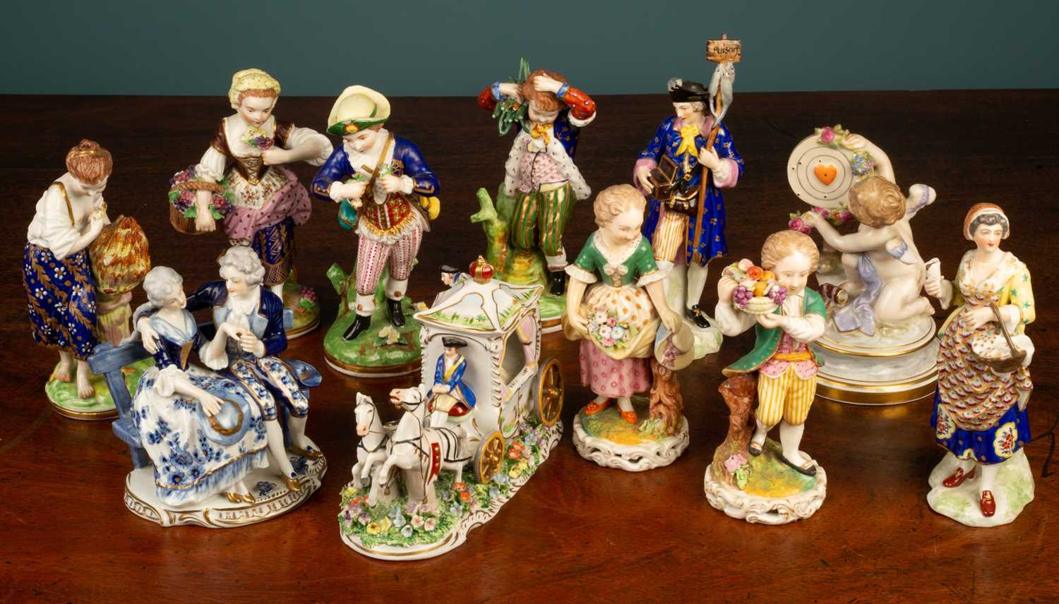 Lot 52 - An assortment of ceramic figures