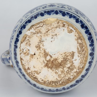Lot 344 - A Dutch delft blue and white jug with a pewter...