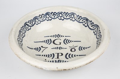 Lot 346 - A rare 18th century English Delft bowl with...