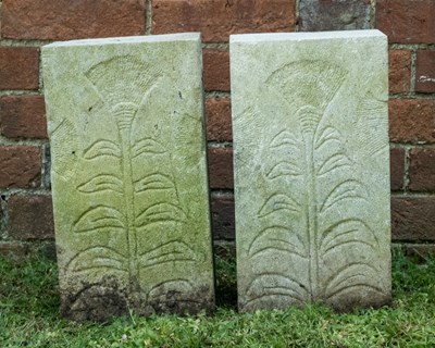 Lot 1358 - A carved stone bench with foliate designs