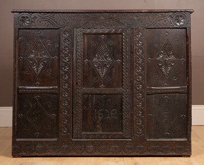 Lot 160 - An oak cupboard