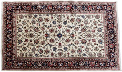 Lot 1063 - A cream ground Meshed rug