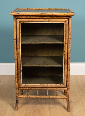 Lot 245 - A chinoiserie-style faux bamboo cabinet