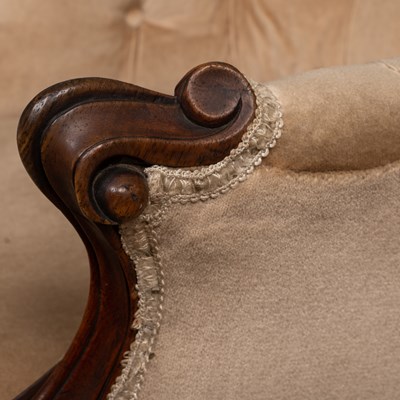 Lot 72 - A 19th century mahogany button-back armchair