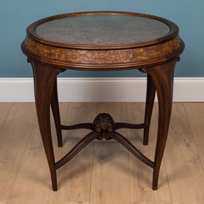 Lot 198 - A circular Art Deco table with glass top