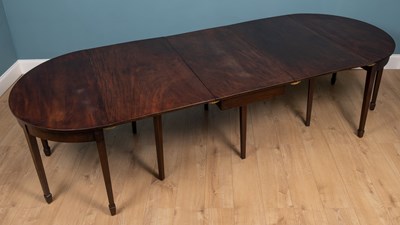 Lot 419 - A 19th century mahogany D-end extendable dining table