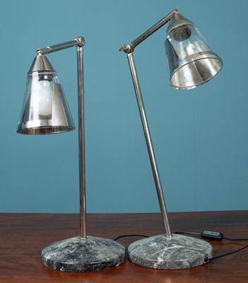 Lot 233 - A pair of adjustable table lamps