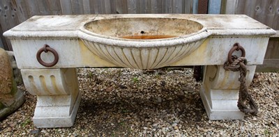 Lot 1354 - A cast reconstituted stone basin or tough