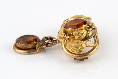 Lot 41 - A Victorian citrine panel brooch, the hollow...