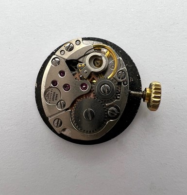 Lot 262 - A lady's 9ct gold bracelet watch by Tissot,...
