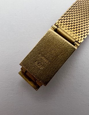 Lot 262 - A lady's 9ct gold bracelet watch by Tissot,...