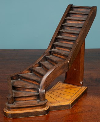 Lot 25 - A hardwood staircase model; a set of three globes; and a glass vase
