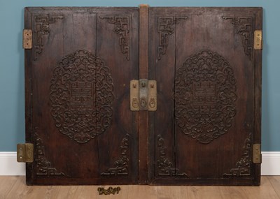 Lot 474 - A pair of Chinese carved wooden doors