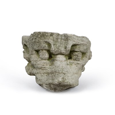 Lot 585 - An early medieval English lime stone carved lions head