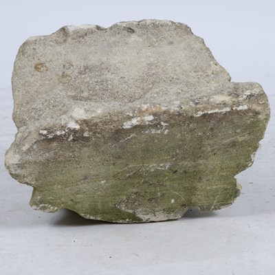 Lot 585 - An early medieval English lime stone carved lions head