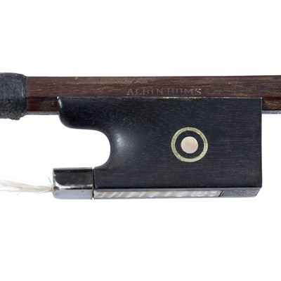 Lot 363 - A white metal mounted German violin bow by...