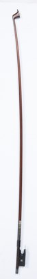 Lot 363 - A white metal mounted German violin bow by...
