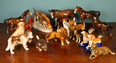 Lot 347 - A Royal Dux porcelain group modelled as two pointer dogs and sixteen further china animal figures