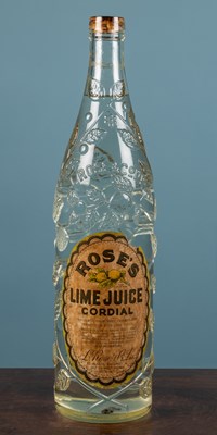 Lot 317 - A large advertising 'Rose's Lime Juice Cordial' bottle