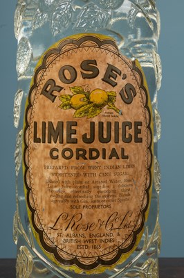 Lot 327 - A large advertising 'Rose's Lime Juice Cordial' bottle