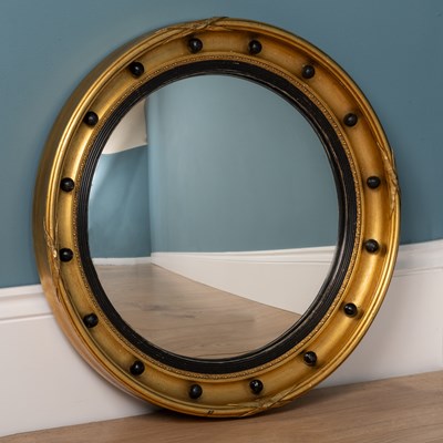 Lot 428 - A mid 20th century Regency style gilt circular convex wall mirror