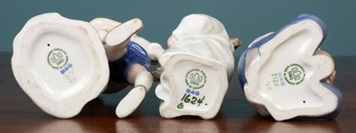Lot 1 - Three Royal Copenhagen porcelain figurines of children