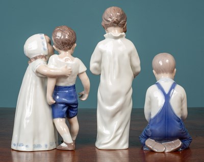 Lot 1 - Three Royal Copenhagen porcelain figurines of children
