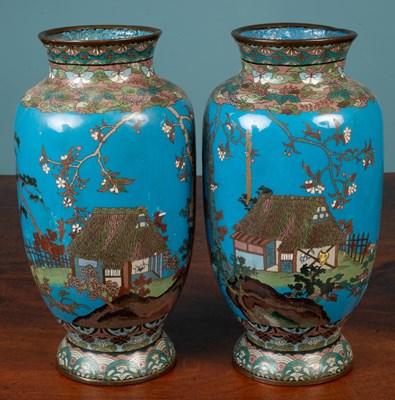 Lot 6 - A pair of Japanese blue ground cloisonné vases
