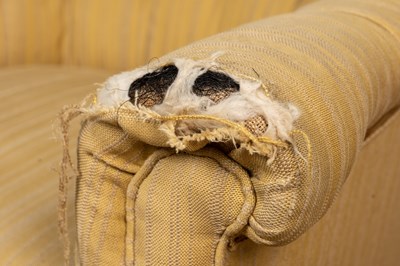 Lot 375 - A Victorian button-back upholstered low armchair