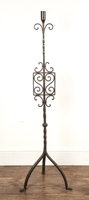 Lot 183 - Wrought iron candlestand with decorative...