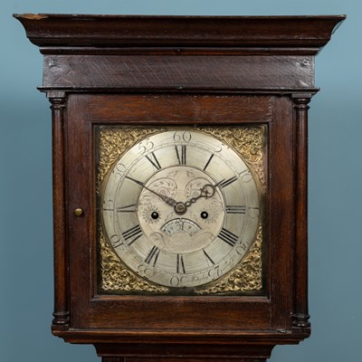 Lot 390 - An antique oak longcase clock