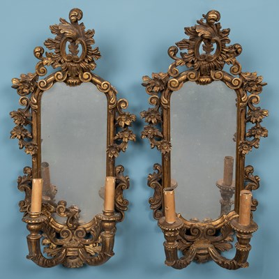 Lot 434 - A pair of possibly Continental carved gilt wooden gesso wall sconces