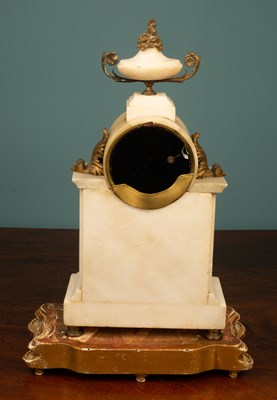 Lot 65 - An antique French alabaster mantel clock