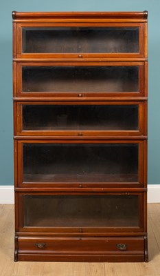 Lot 490 - A walnut Globe Wernicke-style graduated five-tier bookcase