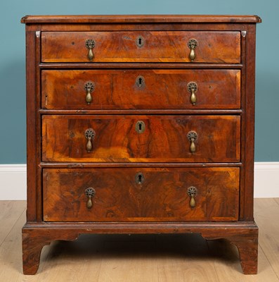 Lot 502 - An antique walnut chest of drawers