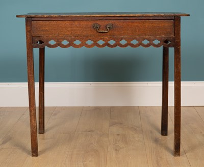 Lot 513 - A George III oak country made side table