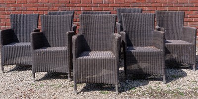 Lot 1329 - A set of eight faux wicker garden armchairs