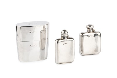 Lot 598 - An Edwardian silver flask and cover, of...